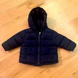Old Navy baby puffer jacket in navy blue.